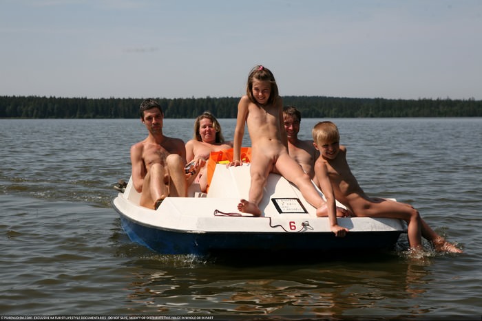 Canadian nudists in the forest on the lake camped Purenudism photo