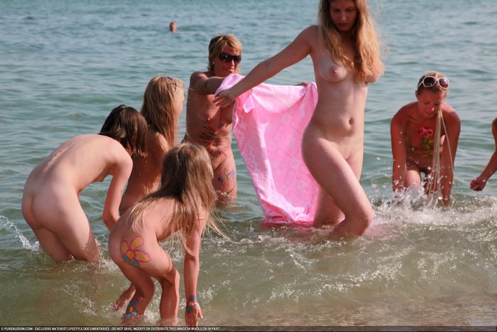 Nudists celebrate the feast of their god, the patron of nudists - Neptune Day photo